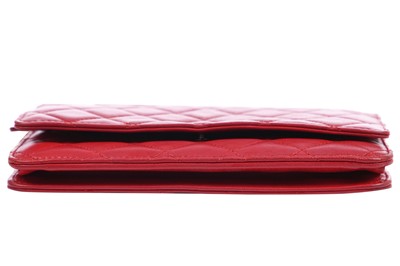 Lot 4 - A Chanel quilted red lambskin leather WOC, 2014