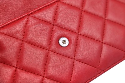 Lot 4 - A Chanel quilted red lambskin leather WOC, 2014