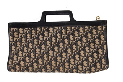 Lot 65 - A Dior monogrammed canvas clutch, 1970s