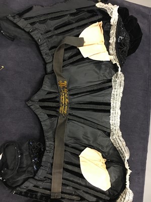 Lot 413 - An Alfred Manning of Dublin black velvet evening gown with three bodices, circa 1900