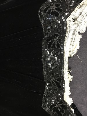 Lot 413 - An Alfred Manning of Dublin black velvet evening gown with three bodices, circa 1900