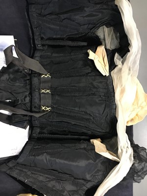 Lot 413 - An Alfred Manning of Dublin black velvet evening gown with three bodices, circa 1900