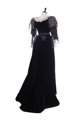 Lot 413 - An Alfred Manning of Dublin black velvet evening gown with three bodices, circa 1900