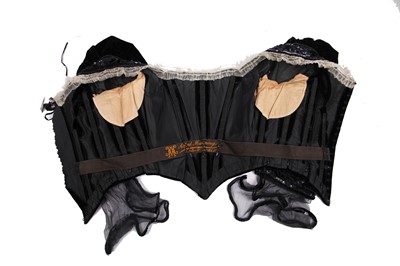 Lot 413 - An Alfred Manning of Dublin black velvet evening gown with three bodices, circa 1900