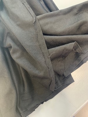 Lot 267 - A group of clothing in shades of purple, black and blue, 1970s-early 1980s