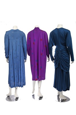 Lot 267 - A group of clothing in shades of purple, black and blue, 1970s-early 1980s