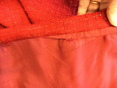 Lot 32 - A Chanel red bouclé wool suit, Autumn-Winter 1983-84
