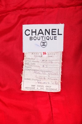 Lot 32 - A Chanel red bouclé wool suit, Autumn-Winter 1983-84