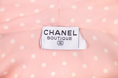 Lot 43 - A Chanel polka-dot printed pink crêpe dress, 1980s