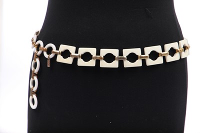 Lot 292 - An Yves Saint Laurent plastic and gilt linked belt, circa 1970