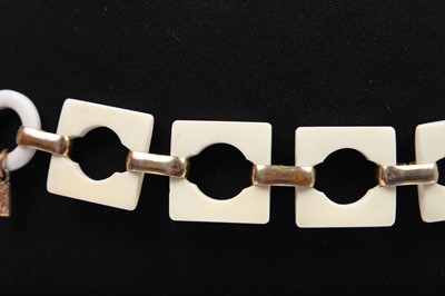 Lot 261 - An Yves Saint Laurent plastic and gilt linked belt, circa 1970