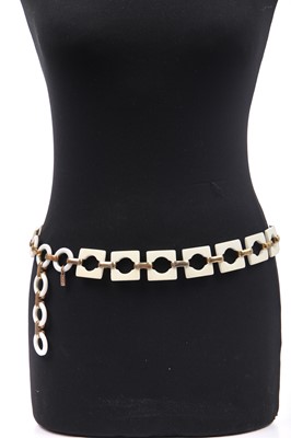 Lot 261 - An Yves Saint Laurent plastic and gilt linked belt, circa 1970