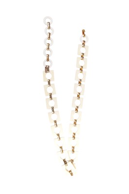 Lot 261 - An Yves Saint Laurent plastic and gilt linked belt, circa 1970