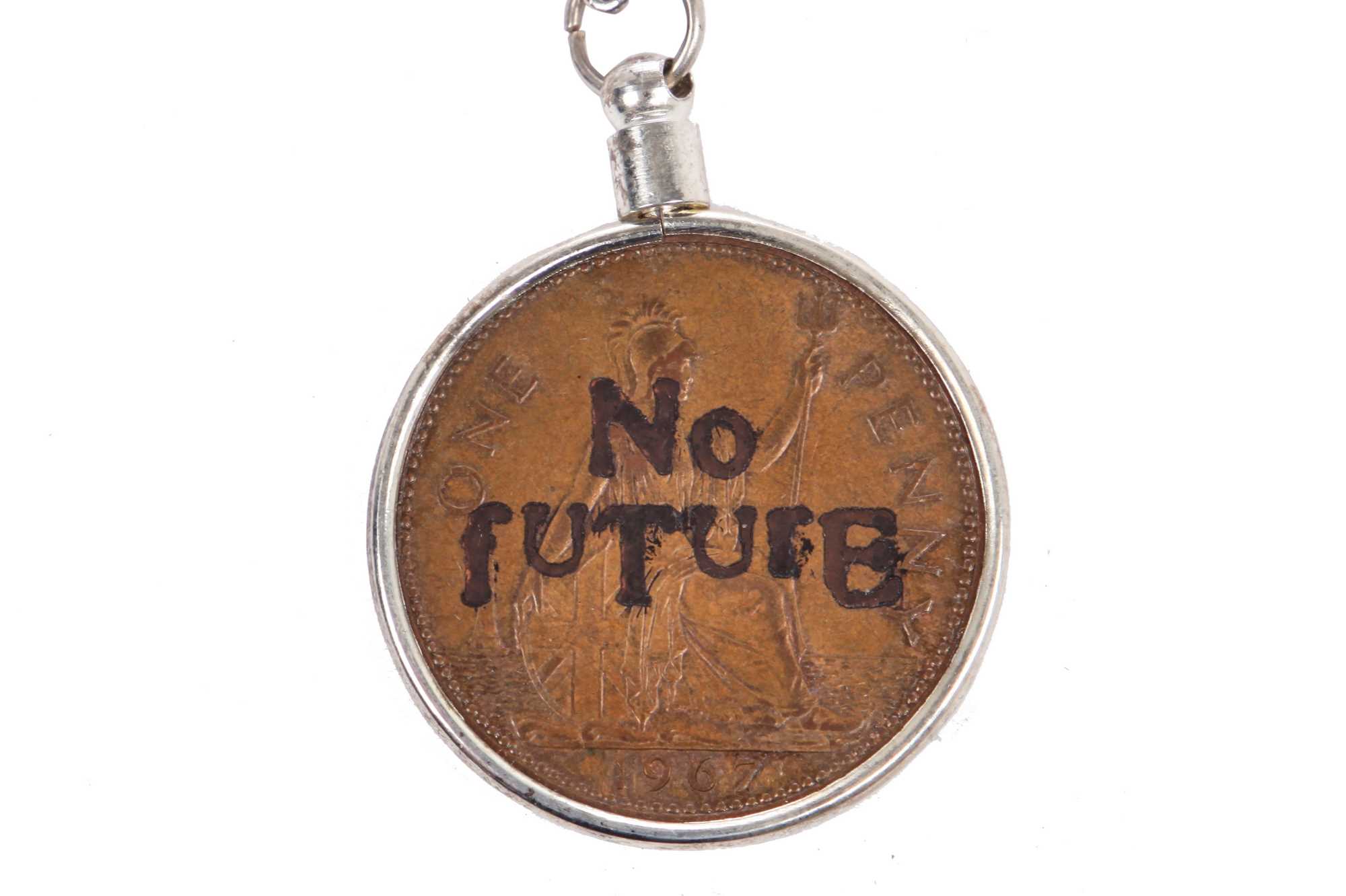 Lot 70 - Jordan's custom-made 'Britannia' penny necklace on silver-coloured metal chain, date unknown