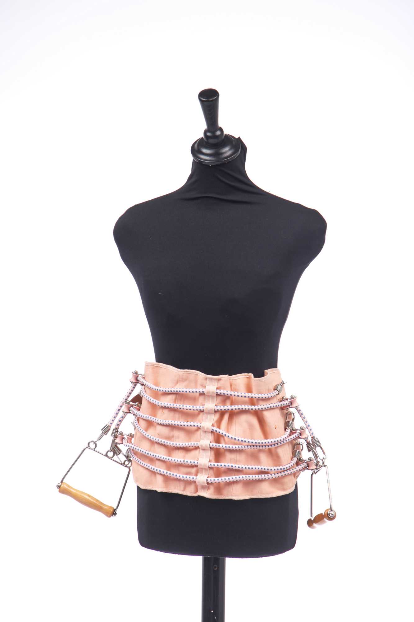 Lot 342 - A Rallie Health Appliances waist-slimming exercise belt, 1957