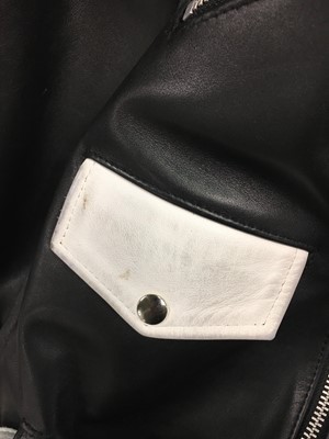 Lot 76 - Jordan's black and white leather jacket, circa 2015