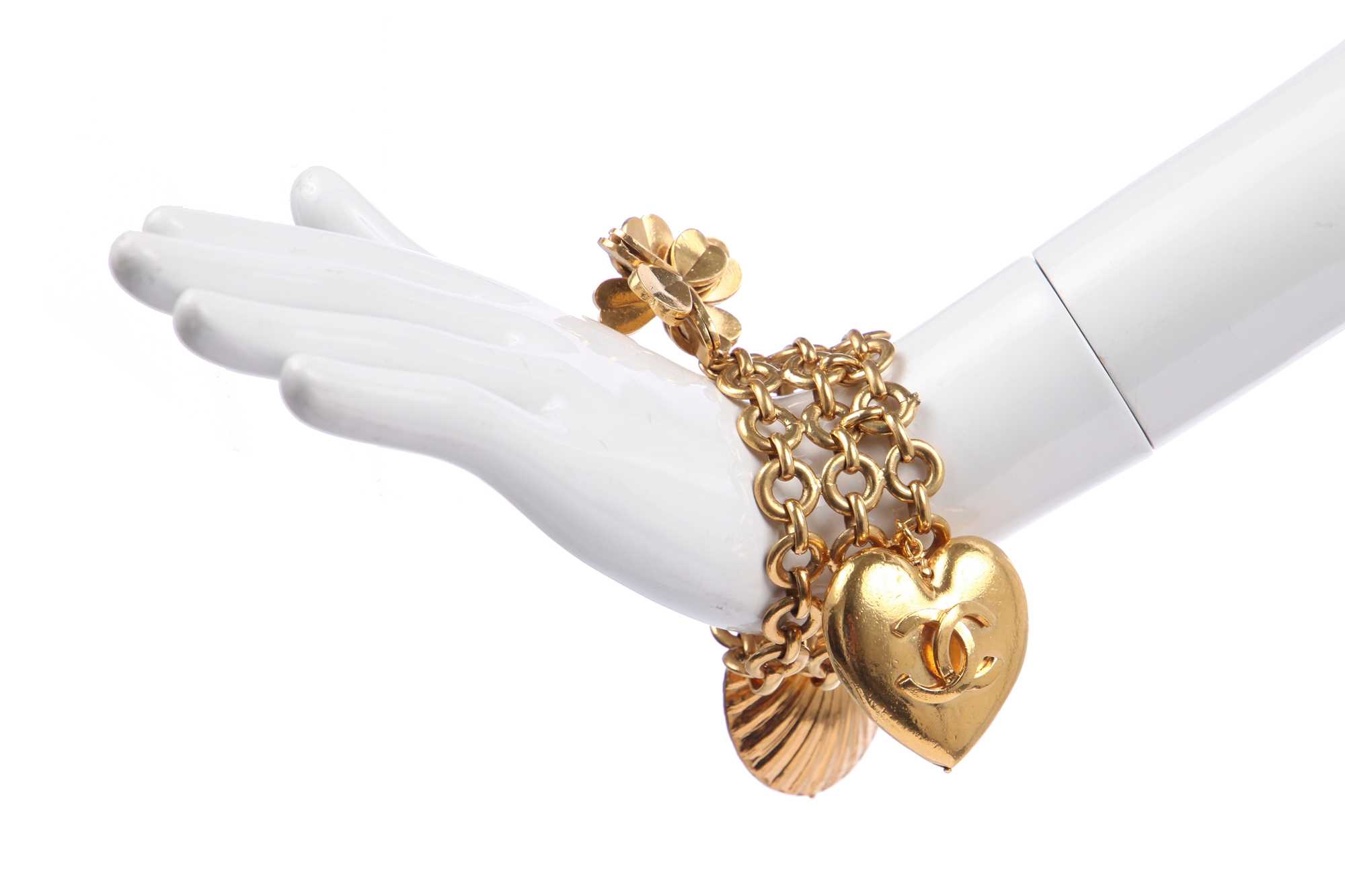 Lot 34 - A Chanel gilt metal charm bracelet, 1980s
