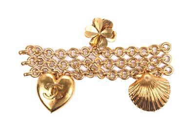 Lot 34 - A Chanel gilt metal charm bracelet, 1980s