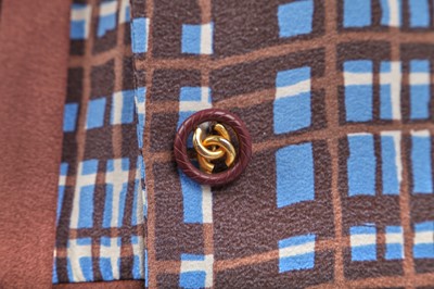 Lot 13 - A Chanel couture printed check silk two-piece ensemble, 1970s