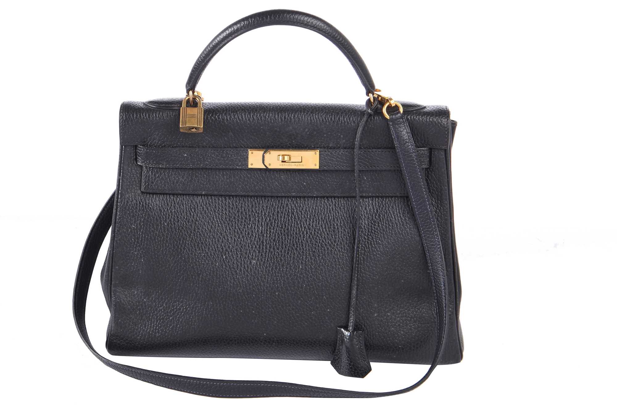 Lot 48 - An Hermès black Fjord leather Retourné Kelly 32, 1990
