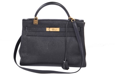 Lot 48 - An Hermès black Fjord leather Retourné Kelly 32, 1990