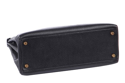 Lot 48 - An Hermès black Fjord leather Retourné Kelly 32, 1990