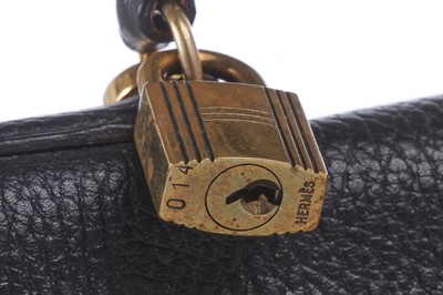 Lot 48 - An Hermès black Fjord leather Retourné Kelly 32, 1990