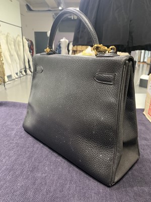 Lot 48 - An Hermès black Fjord leather Retourné Kelly 32, 1990