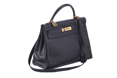 Lot 48 - An Hermès black Fjord leather Retourné Kelly 32, 1990