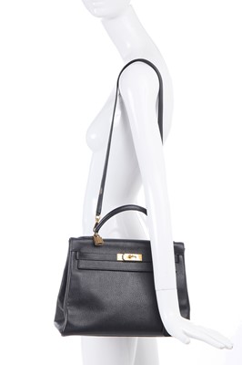 Lot 48 - An Hermès black Fjord leather Retourné Kelly 32, 1990