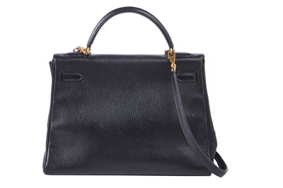 Lot 48 - An Hermès black Fjord leather Retourné Kelly 32, 1990