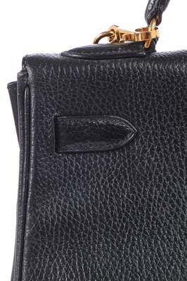 Lot 48 - An Hermès black Fjord leather Retourné Kelly 32, 1990