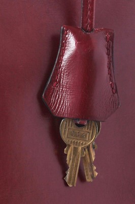 Lot 49 - An Hermès oxblood Box leather Retourné Kelly 32, 1978