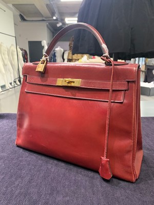 Lot 49 - An Hermès oxblood Box leather Retourné Kelly 32, 1978
