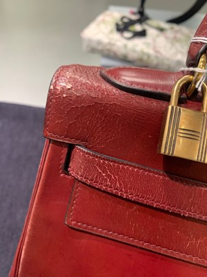Lot 49 - An Hermès oxblood Box leather Retourné Kelly 32, 1978