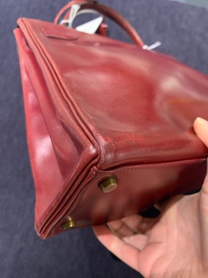 Lot 49 - An Hermès oxblood Box leather Retourné Kelly 32, 1978