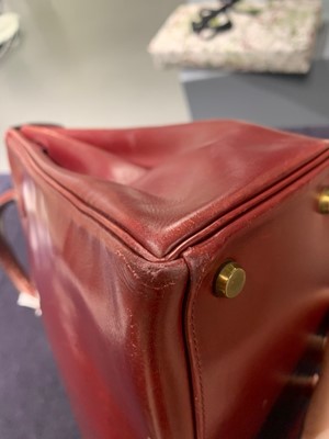 Lot 49 - An Hermès oxblood Box leather Retourné Kelly 32, 1978