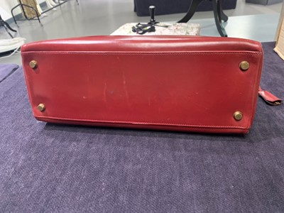 Lot 49 - An Hermès oxblood Box leather Retourné Kelly 32, 1978