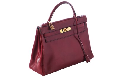 Lot 49 - An Hermès oxblood Box leather Retourné Kelly 32, 1978
