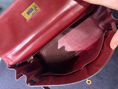 Lot 49 - An Hermès oxblood Box leather Retourné Kelly 32, 1978