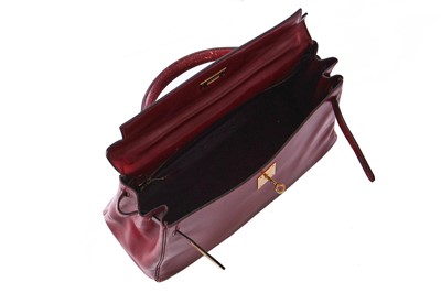 Lot 49 - An Hermès oxblood Box leather Retourné Kelly 32, 1978