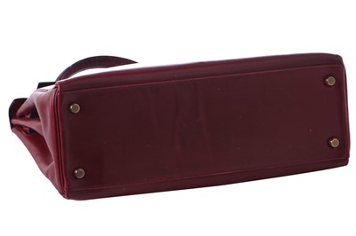 Lot 49 - An Hermès oxblood Box leather Retourné Kelly 32, 1978