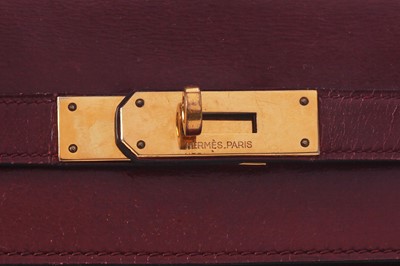 Lot 49 - An Hermès oxblood Box leather Retourné Kelly 32, 1978