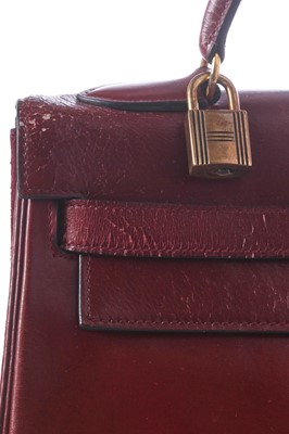 Lot 49 - An Hermès oxblood Box leather Retourné Kelly 32, 1978