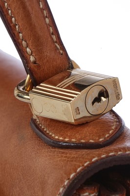 Lot 47 - An Hermès canvas and natural leather Retourné Kelly 28, 1979