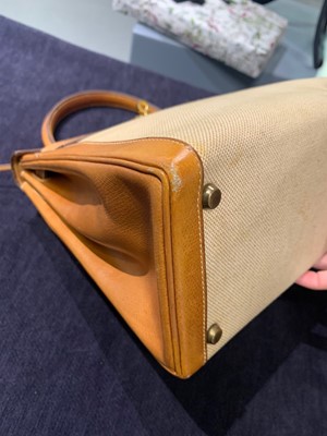 Lot 47 - An Hermès canvas and natural leather Retourné Kelly 28, 1979