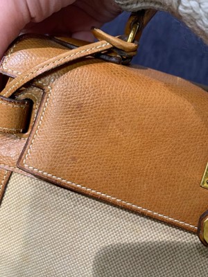 Lot 47 - An Hermès canvas and natural leather Retourné Kelly 28, 1979
