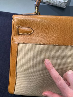 Lot 47 - An Hermès canvas and natural leather Retourné Kelly 28, 1979