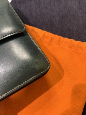 Lot 54 - An Hermès Fonsbelle bag in dark green Box leather, late 1960s