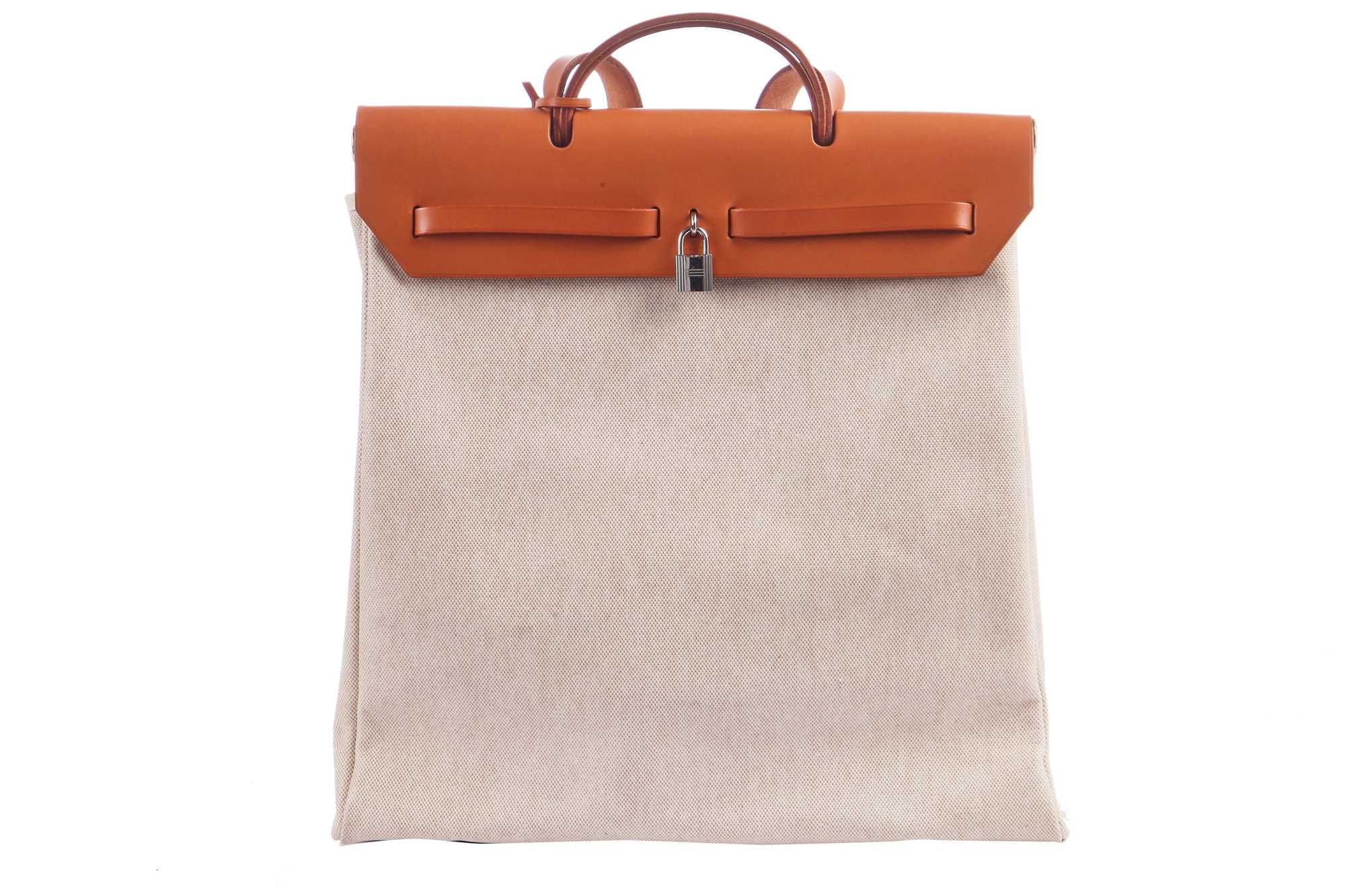 Lot 52 - An Hermès canvas and natural leather Herbag, modern